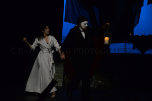 The Phantom and Christine traveling through the opera house.